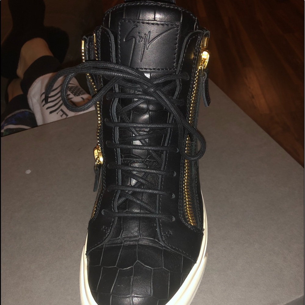 Black and gold Giuseppe high tops